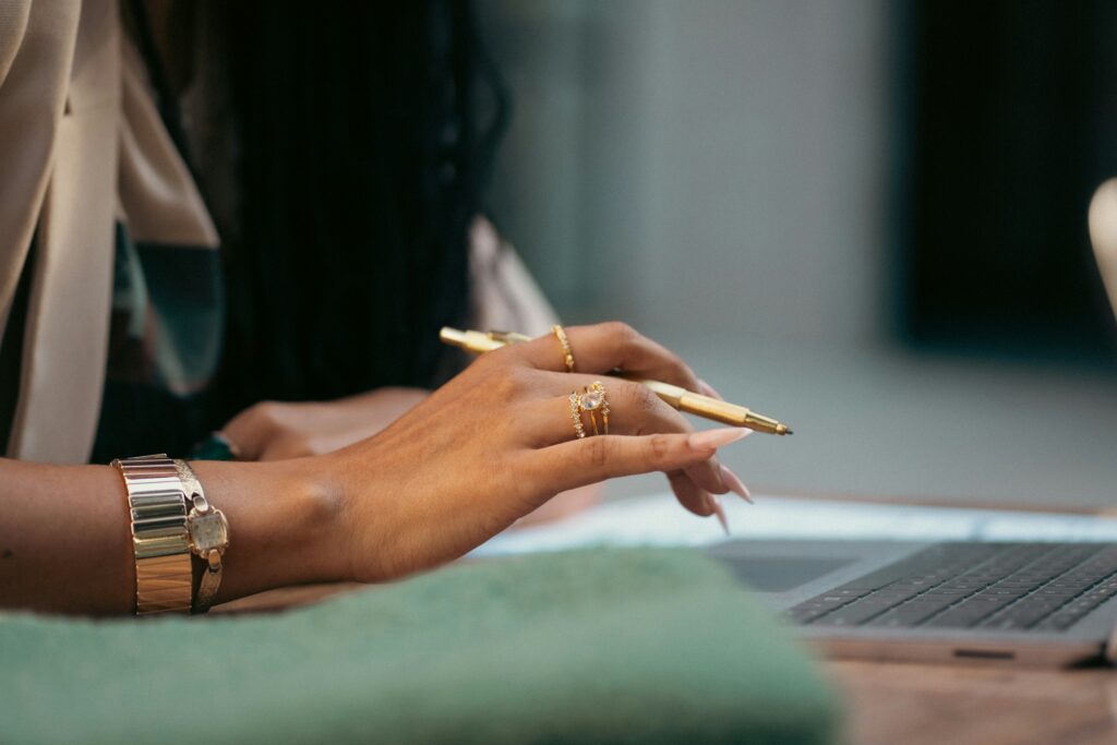 Business professional working at a laptop representing MPact Logistics' vision for smarter business operations